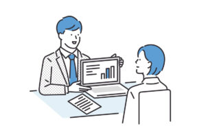 企業の担当者さんに説明する社員