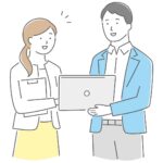 パソコンを見ながら話し合う支援員と利用者